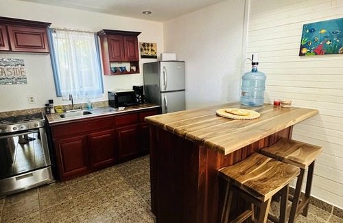 Sandy Bay Hotel | Seaside condo @ The Blue Bahia Resort in Sandy Bay