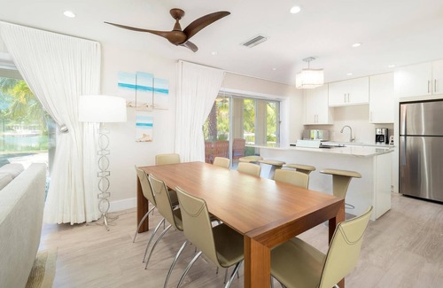 Rum Point House | Seaside Dreams: Contemporary Oasis on Bio-Bay With Two Free Kayaks