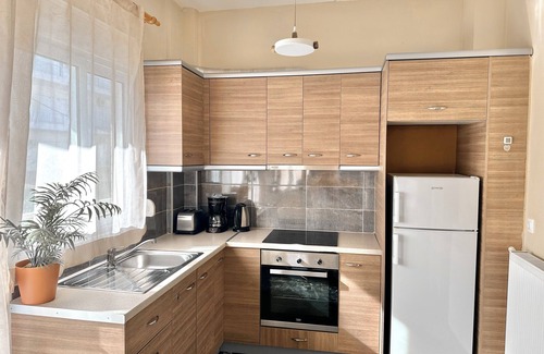 Olymbiaki Akti Apartment | Seaside Family Home with Wraparound Balcony & 2 Baths - Blue Zone Homes