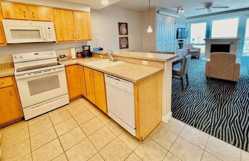 Seaside Condo | Seaside Getaway: Your Beachfront Resort Retreat on the Promenade.