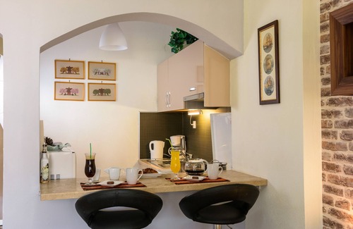 Milatos Beach Apartment | "Seaside Studios", BY THE SEA, in a colorful garden! Ideal for couples
