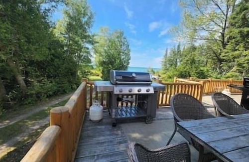 Kincardine Cottage | Secluded 1200' beachfront private 64 acre log home