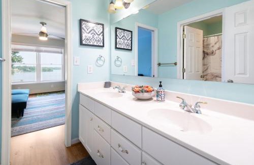 Louisa House | Secluded 3 Acre 5 BR Resort with a Private Heated Salt-Water Pool, Hot tub, Boat Dock, Sauna, and Game Room