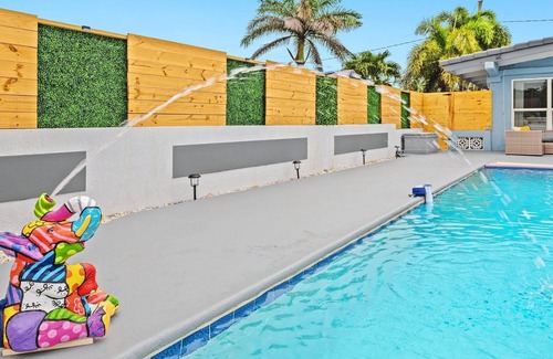 Lauderdale Isles House | Secluded Canal Sanctuary: Private Beach, Boat Dock, Pool, Mini-Golf Extravaganza