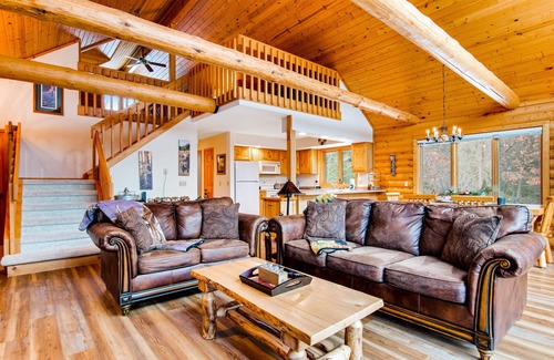 Friendship Cabin | Secluded, dog-friendly home with tree-lined view, firepit, fireplace, & deck