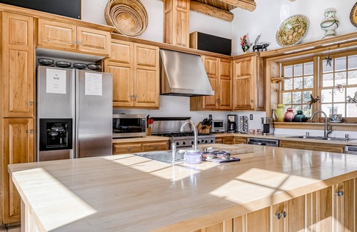 Valdez House | Secluded, dog-friendly adobe home with patio, kivas, & washer/dryer
