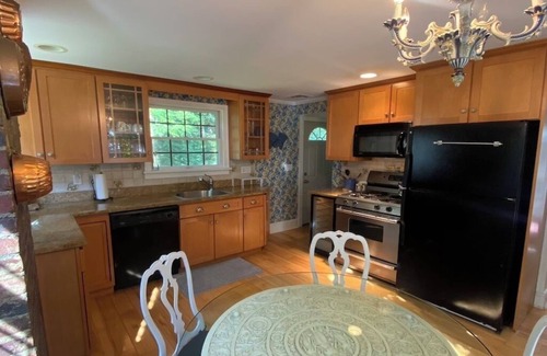 Laurel Hollow Cottage | Secluded, private woodland cottage with two bedrooms and stone patio for summer!