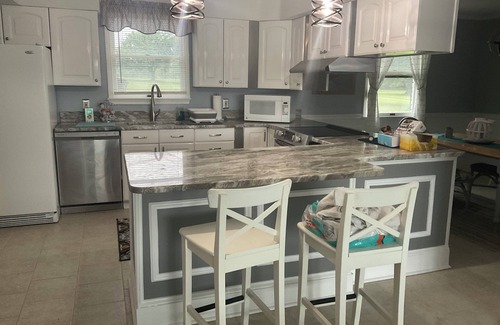 White Marsh Villa | Secluded Waterfront Retreat 2 bed 1 1/2 baths private guest house w Pool & Beach