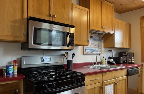 Two Rivers Cottage | See the Lake! Hear the Waves! Steps to the Beach! Entire cottage. 2 bikes.