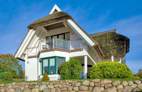 Seedorf Apartment | Seedörper Reethus mit Hafenblick, Kamin und Sauna