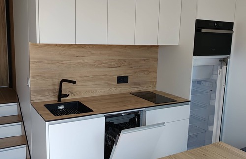 Mouroux Apartment | Self-contained accommodation with outdoor area near various parks