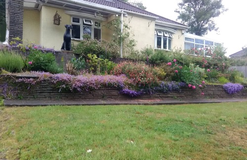 Pontypridd House | Semi Rural, quirky and spacious, with games room/conservatory and large garden.