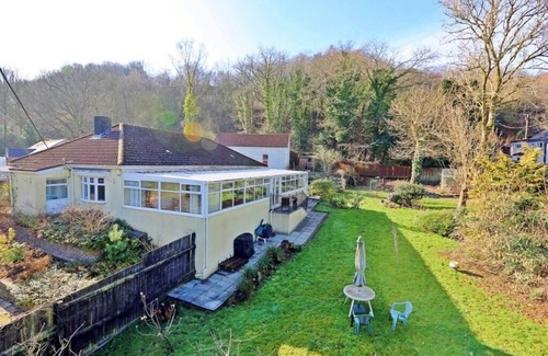 Pontypridd House | Semi Rural, quirky and spacious, with games room/conservatory and large garden.