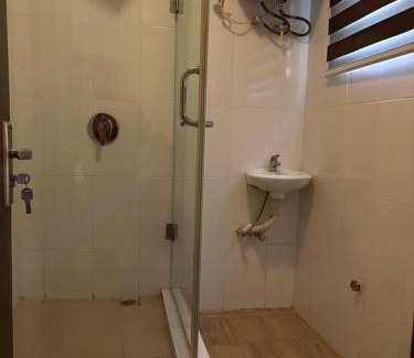 Abeokuta Apartment | Serene 3BR Retreat with Lush private Garden, mini gym and spa access