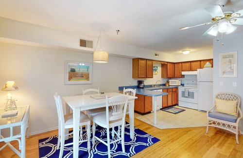 Caine Woods Condo | Serene condo with central AC, deck & washer/dryer - near golf
