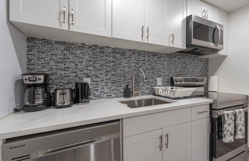 Southeast Calgary House | Serene Elegance: 2BR Gem with Modern Comforts