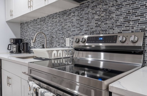 Southeast Calgary House | Serene Elegance: 2BR Gem with Modern Comforts