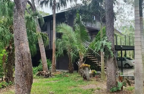 Agnes Water Apartment | Serenity a Tropical oasis set on 4 acres of land with pool.