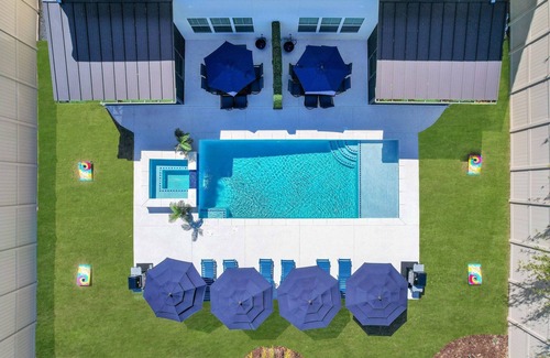Saint Simons Heights House | Serenity Oasis - Villa 2 - Professionally Designed Duplex Home with Luxurious Heated Pool and Spa!