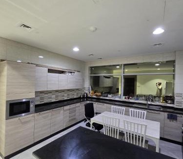 Madinat Zayed Apartment | Shared room