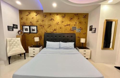 Balibago Apartment | Sheryll Escapes - Kandi Palace Grand 2 BR! Housekeeping, Internet!