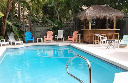 Siesta Key Village House | SHORT WALK TO VILLAGE, BEACH - HEATED POOL - LUSH LANDSCAPINGn2 SEPARATE UNITS.