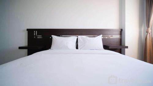 Surabaya Apartment | Simple 2BR with Extra Bed at Menara Rungkut Apartment By Travelio