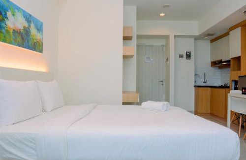 Pekayon Jaya Apartment | Simple Studio Apartment at Grand Kamala Lagoon By Travelio