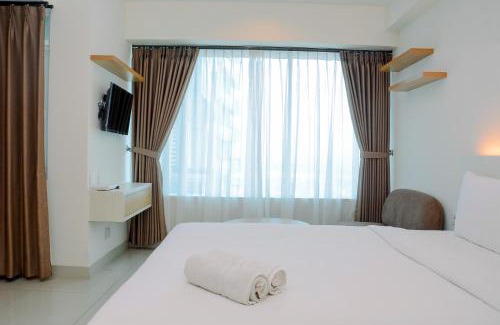 Pekayon Jaya Apartment | Simple Studio Apartment at Grand Kamala Lagoon By Travelio