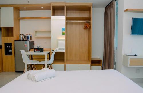 Pekayon Jaya Apartment | Simple Studio Apartment at Grand Kamala Lagoon By Travelio