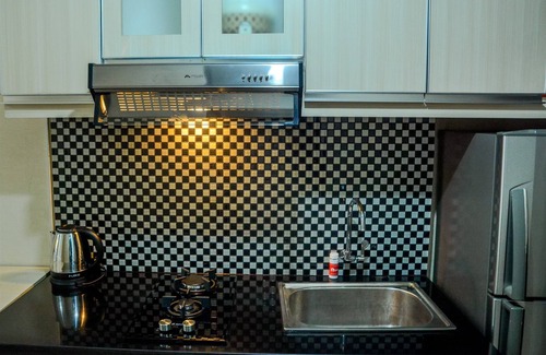 Panunggangan Utara Apartment | Simply Studio Room at Grand Serpong Apartment By Travelio