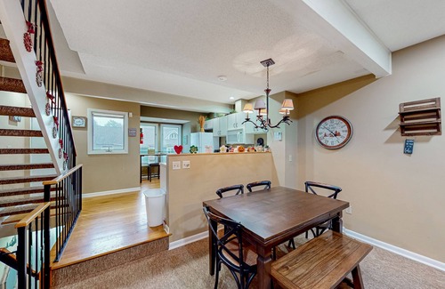 McHenry House | Ski-in/out townhome with free WiFi, wood fireplace, gas grill, & deck - dogs OK