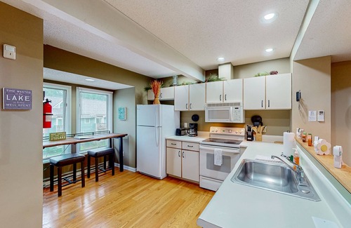 McHenry House | Ski-in/out townhome with free WiFi, wood fireplace, gas grill, & deck - dogs OK