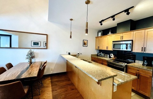 Golden Condo | Ski in/out with brand new hot tub. Top floor Palliser Lodge.
