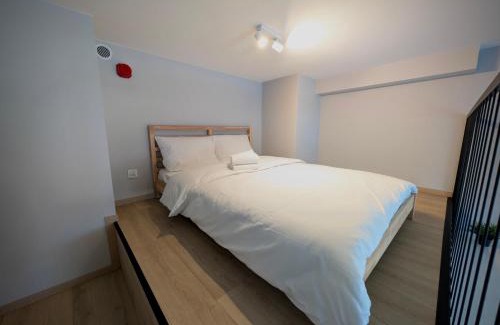 Fabryczna Apartment | Sky Loft Wrocław Apartment by BookingHost