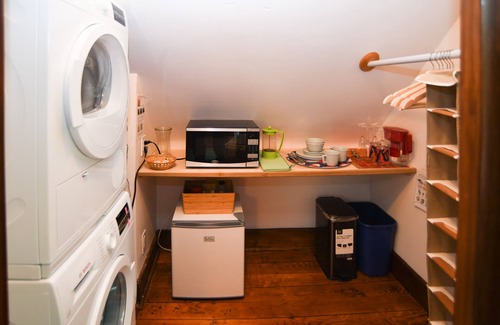 Egleston Square House | Skylit Suite in Musical home