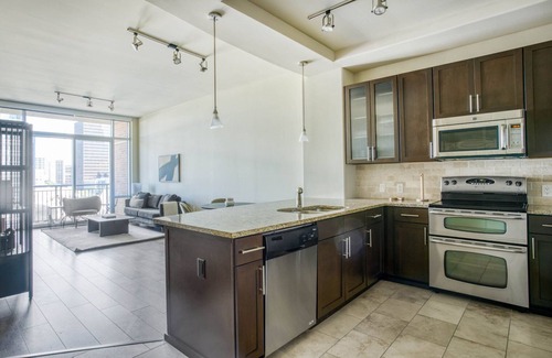 Second Street District Apartment | Sleek Downtown 1BR w/Gym, W/D & Deck, walk to 6th St bars, by Blueground