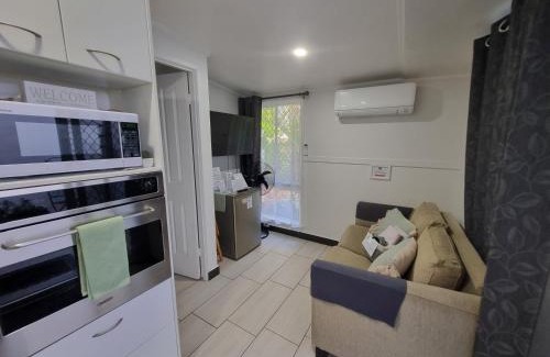 Caloundra Apartment | Small PET FRIENDLY Granny flat with paved courtyard