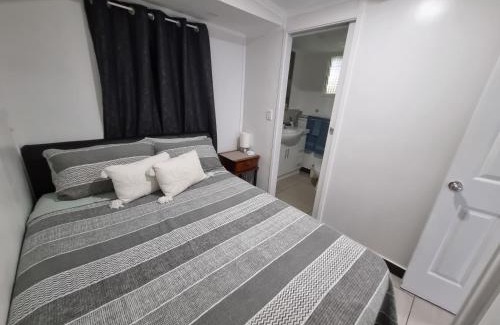 Caloundra Apartment | Small PET FRIENDLY Granny flat with paved courtyard