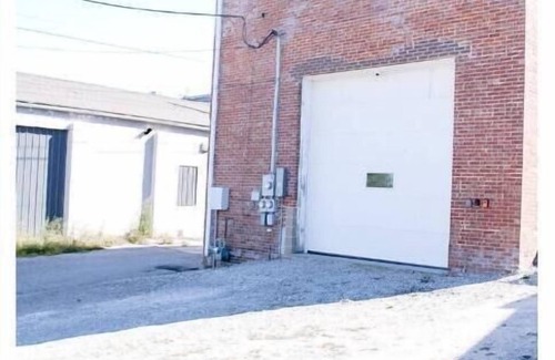 Williamsburg Apartment | Small-Town Loft: Harvester - Modern Comfort in 1890 Historical Brick Building