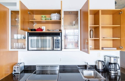 Logan Circle Apartment | Smart Logan Circle 1BR w/W/D, Roof BBQ, walk to Metro, by Blueground