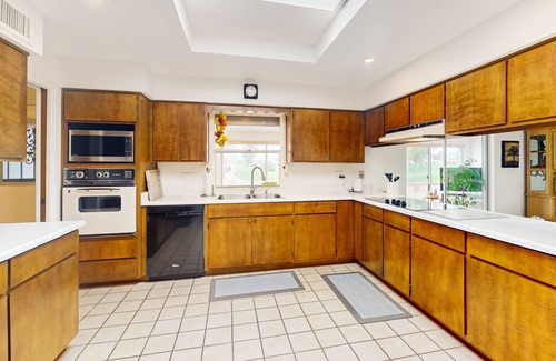 Sunland Village House | Snowbird-friendly golf-front home with pool, hot tub, grill, smart TVs, W/D, AC