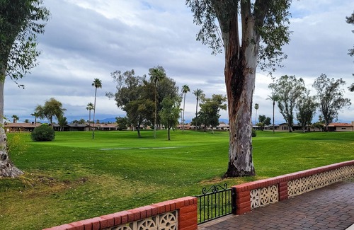 Sunland Village House | Snowbird-friendly golf-front home with pool, hot tub, grill, smart TVs, W/D, AC