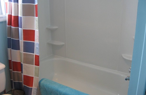 Saint-Henri-de-Taillon House | Snowmobile paradise, sandy beach, crystal clear water and comfort assured.