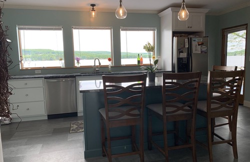 Bradford House | Soak in the sunset and celebrate the beauty of any season on the lake!