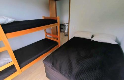 Guaratuba House | Sobrado Novo n 02 com Terraço Panorâmico e Churrasqueira - 4 min a pe ate a Praia - Condomínio Sobre as Ondas