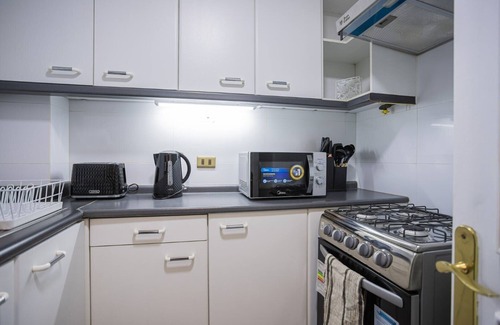 Providencia Apartment | Sophisticated Comfort Just Steps from Mall