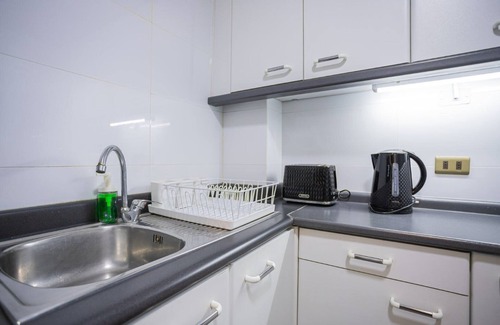 Providencia Apartment | Sophisticated Comfort Just Steps from Mall