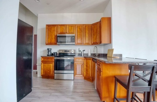 West Poplar Apartment | Sosuite | 2BR Apt w W/D, Gym, On-Site Restaurant