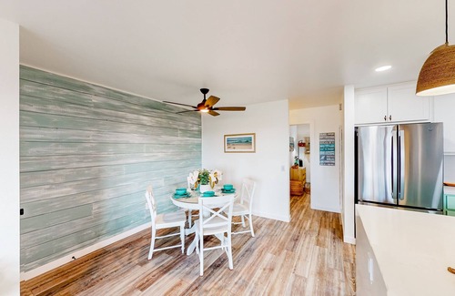 South Oceanside Condo | Sound view condo with modern interior, gas fireplace, balcony, & W/D access